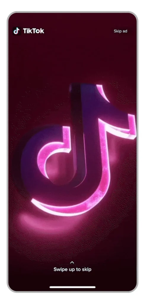Anúncio animado do TikTok exibindo o formato TopView com logotipo iluminado em tela de smartphone